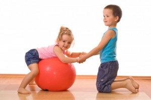 2-children-playing-with-exercise-ball